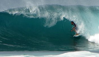 Unidentified Surfer inside a Backdoor Tube at the Billabong Pipe Masters Triple Crown of Surfing